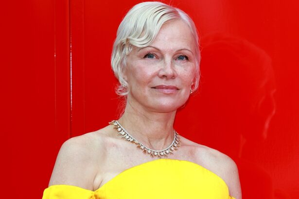 Pamela Anderson Rocks Backless Dress With Slit at Kering Foundation Dinner