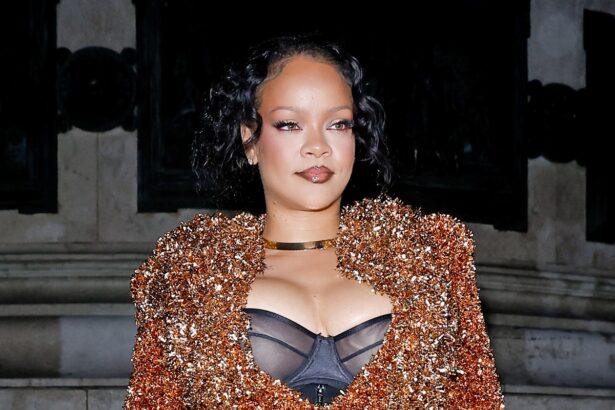 Rihanna Wears Gold Skirt Suit at Paris Fashion Week