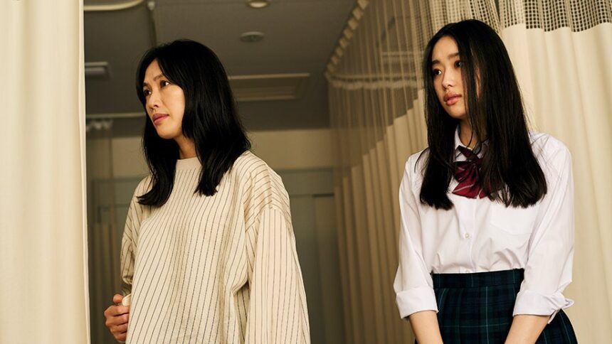 The translation of “Between Us’ Review: A Fitfully Ambitious Japanese Drama” into Greek is: 

“Κριτική του ‘Between Us’: Ένα περιστασιακά φιλόδοξο Ιαπωνικό Δράμα”